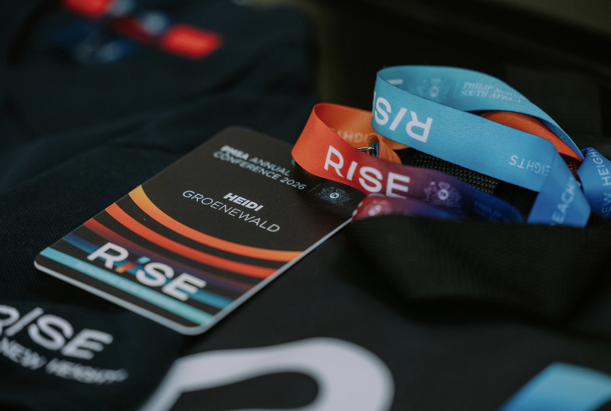 RISE Annual Conference badges and lanyards