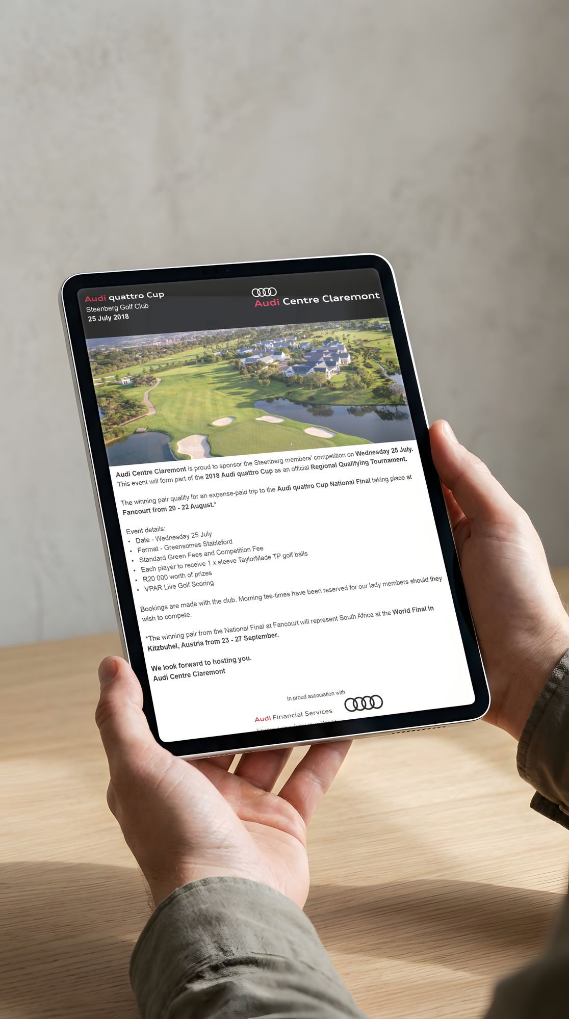 Audi quattro Cup invitation on a tablet