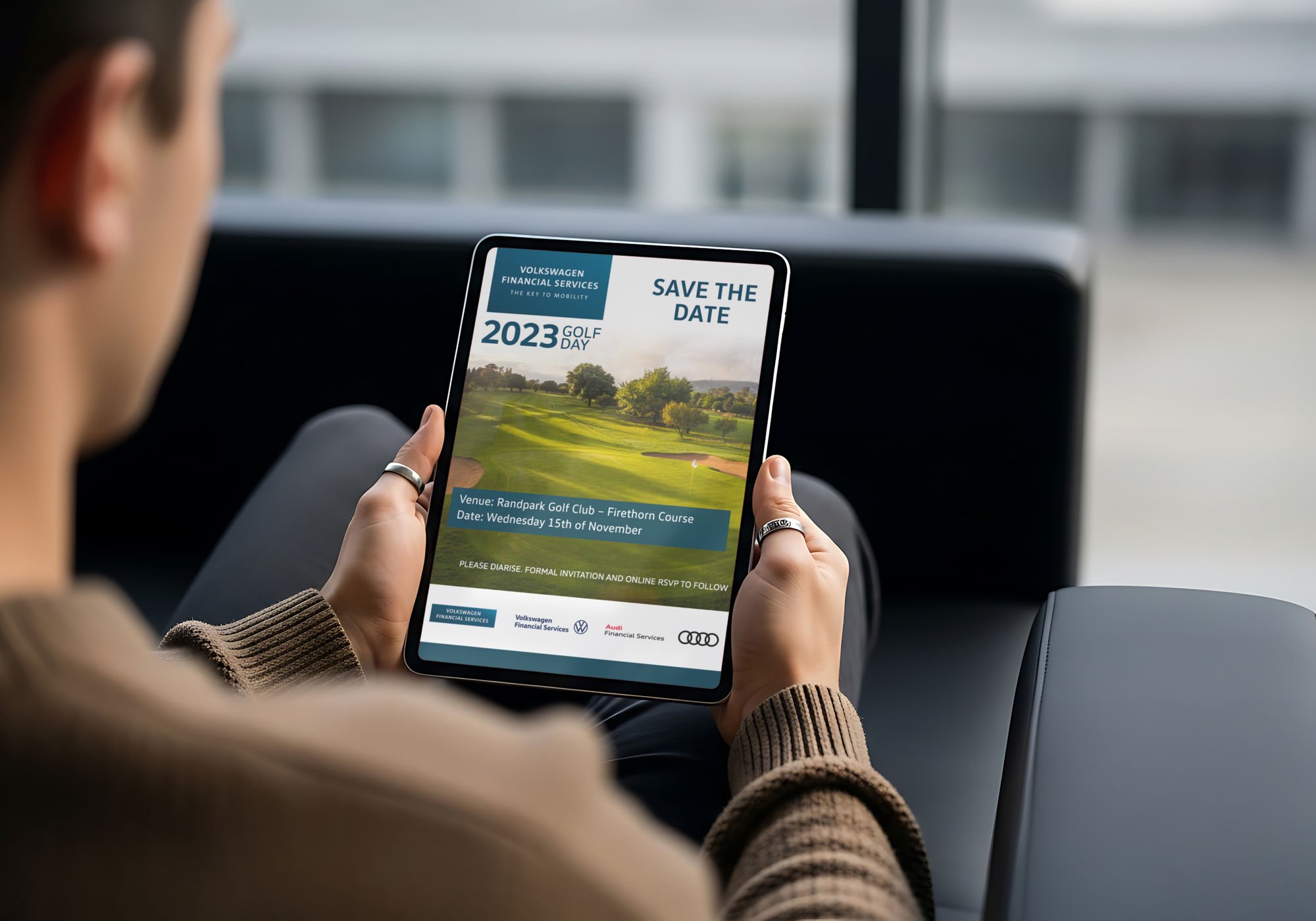 Volkswagen Financial Services Golf Day save-the-date on a tablet